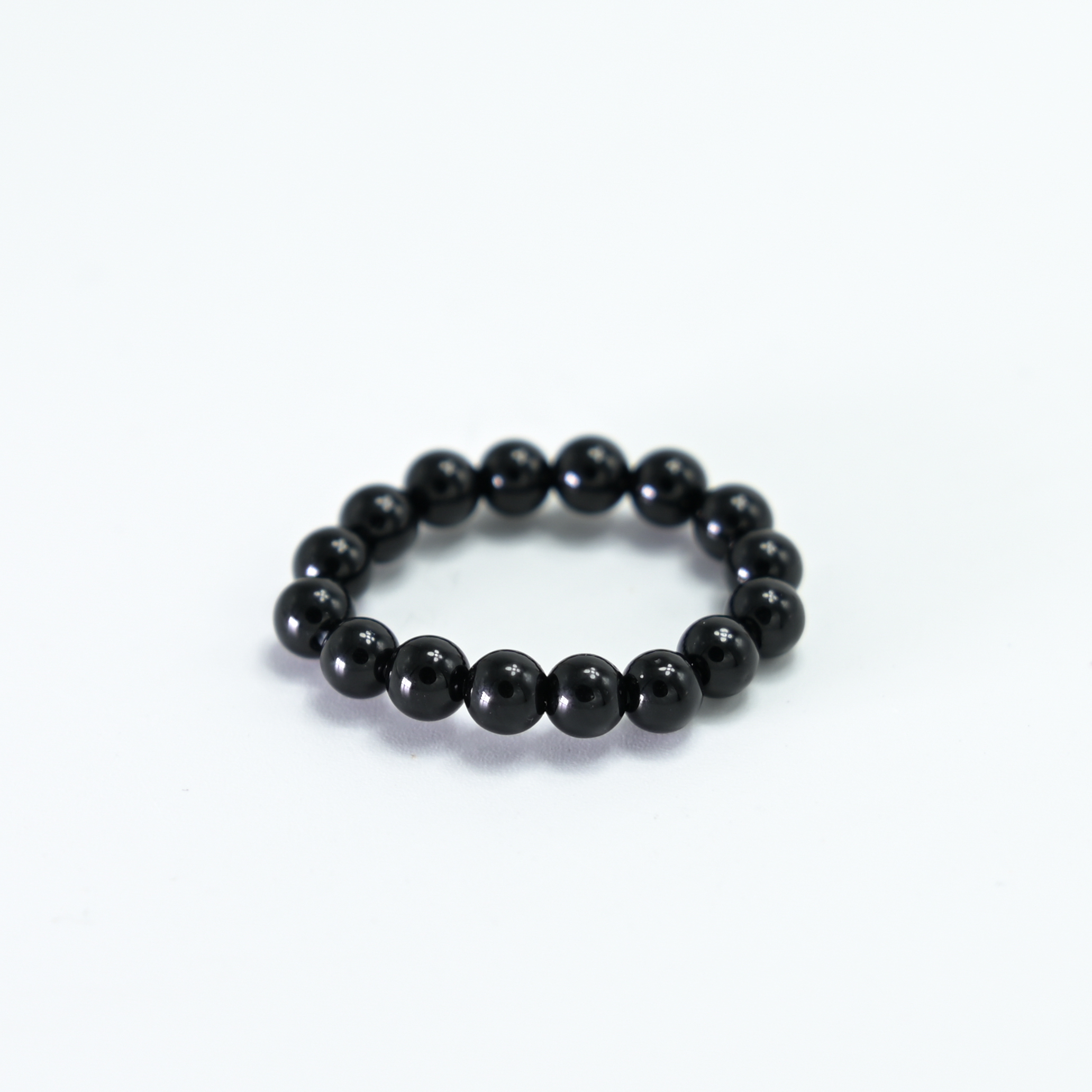 Inel cu Onix Negru – Forță Interioară, Împământare și Scut Energetic | Cristale 4 mm pe Gută Elastică Inel cu Onix Negru – Forță Interioară, Împământare și Scut Energetic | Cristale 4 mm pe Gută Elastică